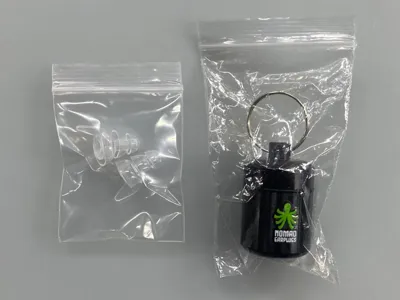 Packaged Nomad earplugs with keychain case